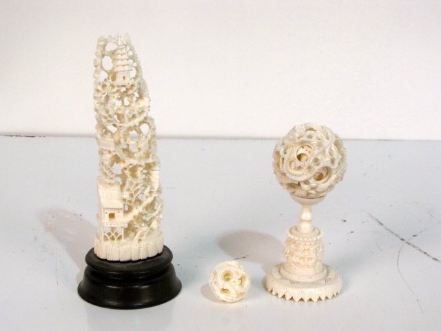 3 pcs. CHINESE CARVED IVORY: 5" puzzleball stand, 6 1/4" tree with houses and small puzzle ball. Very good condition.