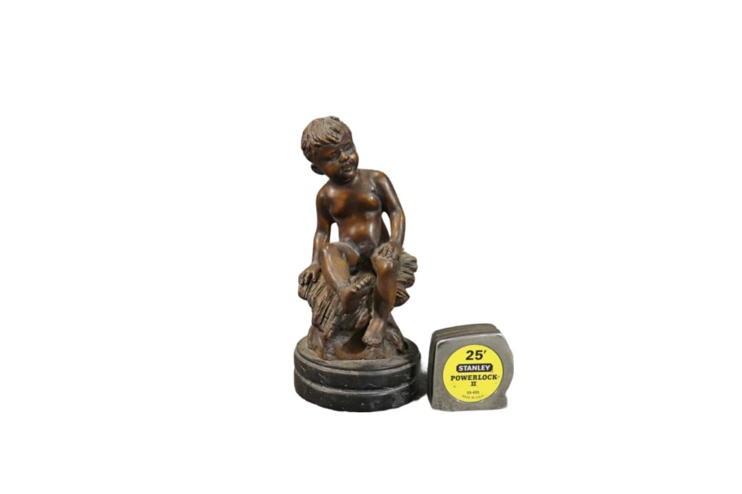 MOREAU BRONZE SCULPTURE OF YOUNG BOY: Moreau on back of bronze. Bronze. 10 7/8" h x 6" w x 6 3/4' d.