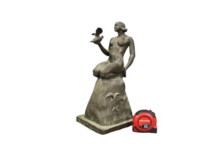 BRONZE SCULPTURE OF SEATED WOMAN WITH DOVE