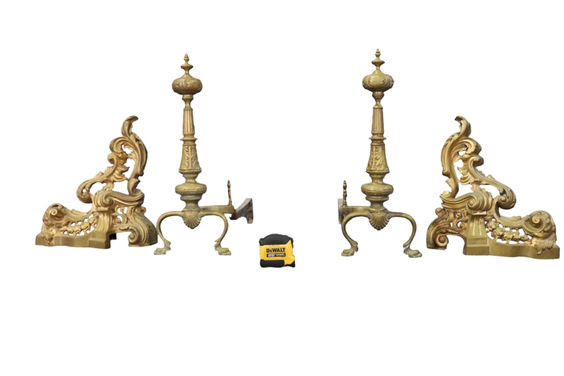 4 PIECE BRONZE ANDIRONS: Bronze. 4 piece. 2 measure 15" h x 14 1/4" w x 5 5/8" d. 2 measure 21" h x 8 1/4" w x 19 3/4" d.
