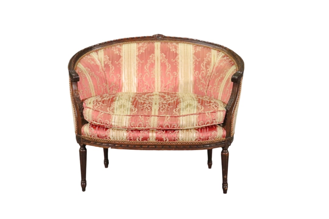 LOUIS XVI STYLE SETTEE: Carved wood frame. Upholstered. Nail head trim. 33 3/4" h x 39 1/2" w x 27 1/4" d. Seat height 19 1/2".