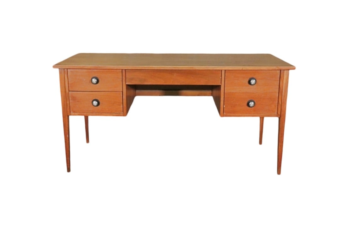 FOUNDERS WALNUT DESK: Walnut. 4 drawers. Metal hardware. 29 1/8" h x 58" w x 24" d.