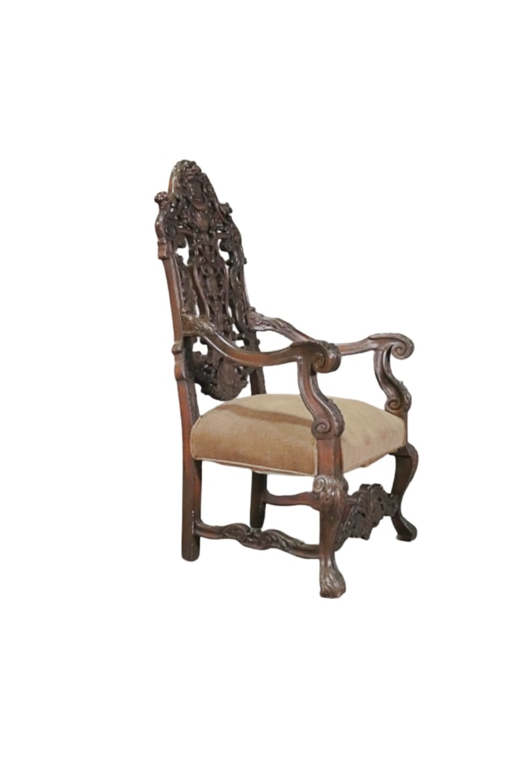 CARVED THRONE CHAIR: Carved wood frame. Upholstered seat. 57" h x 31" w x 32" d. Seat height 21 1/2".