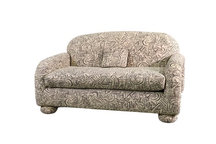 DIRECTIONAL UPHOLSTERED LOVE SEAT