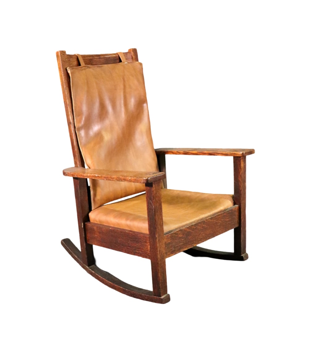 STICKLEY BROTHERS QUAINT ROCKING CHAIR: Quarter sawn oak frame. Vinyl upholstery. 40 1/8" h x 27 1/8" w x 29 3/8" d. Seat height 15 1/4".