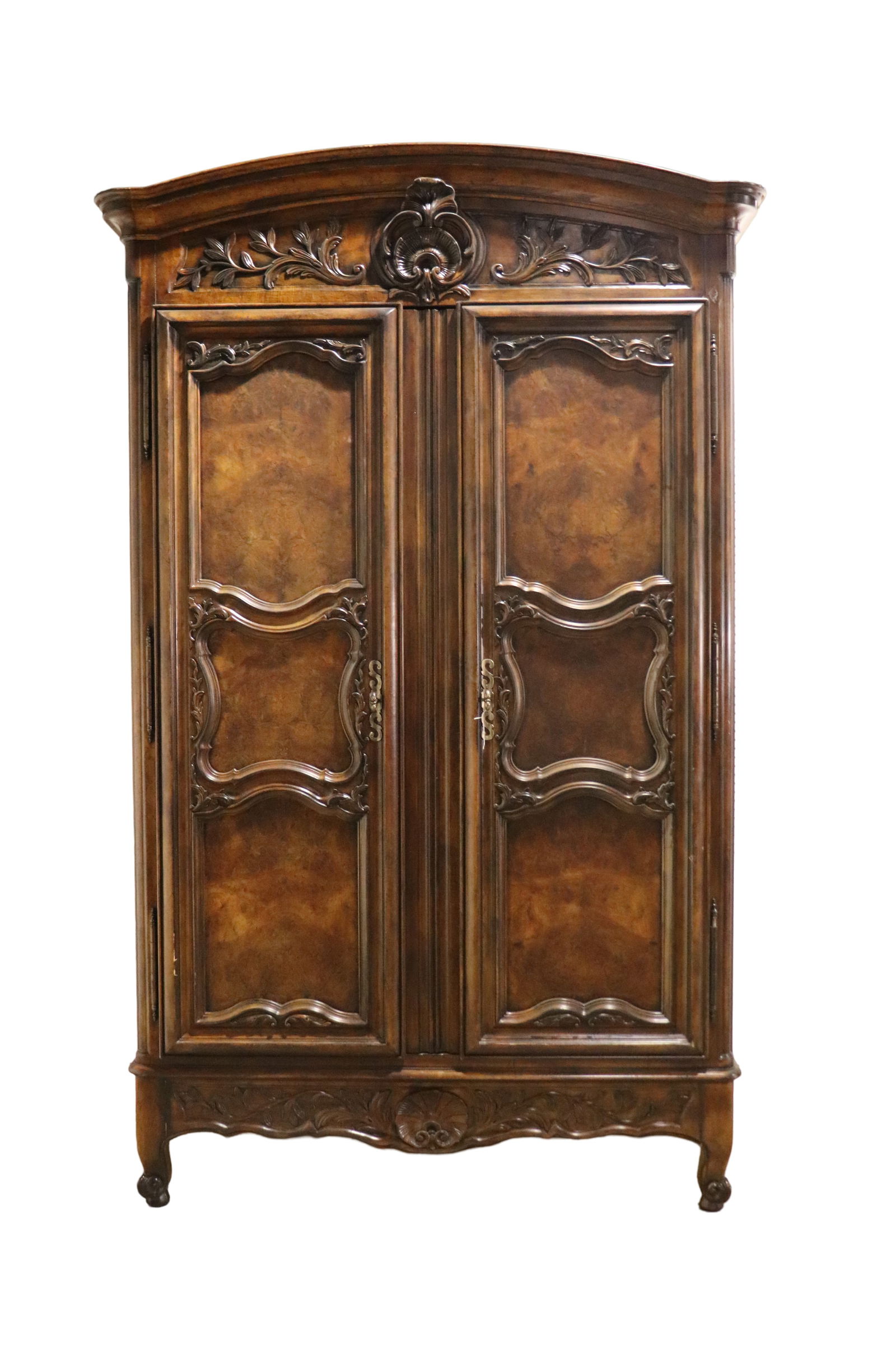 HENREDON FRENCH ARMOIRE: Burl walnut doors. Carved wood. 2 doors containing 3 shelves and 4 dovetailed drawers. Metal hardware. 103 3/4" h x 66" w x 27" d.