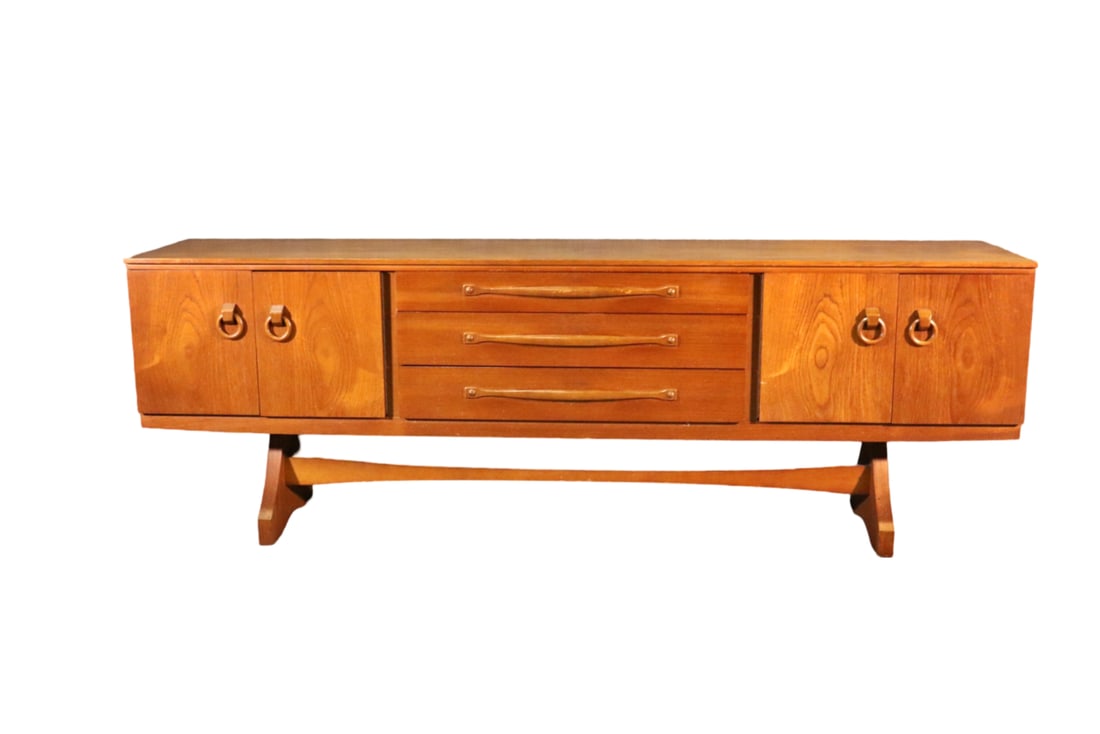 MODERN TEAK SIDEBOARD: Teak. 3 drawers. 2 doors on each side containing 1 shelf on each side. 29 3/8" h x 85 1/8" w x 18" d.