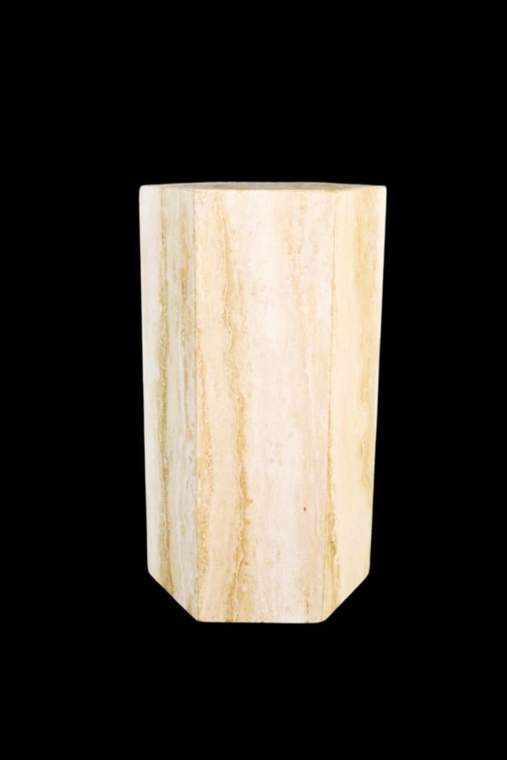 TRAVERTINE HEXAGONAL PEDESTAL: Travertine. 29 1/8" h x 17" w x 14 3/4" d.