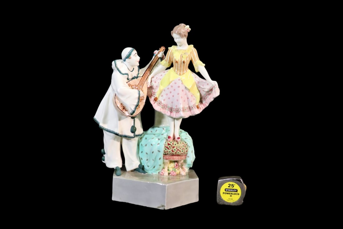 ANTIQUE CAPODIMONTE SCULPTURE: Illegibly marked. Porcelain. Painted. 4922 14 32 stamped on back. On bottom stamped Roman Number 3 21 H. 20" h x 13 1/2" w x 9 1/2" d.