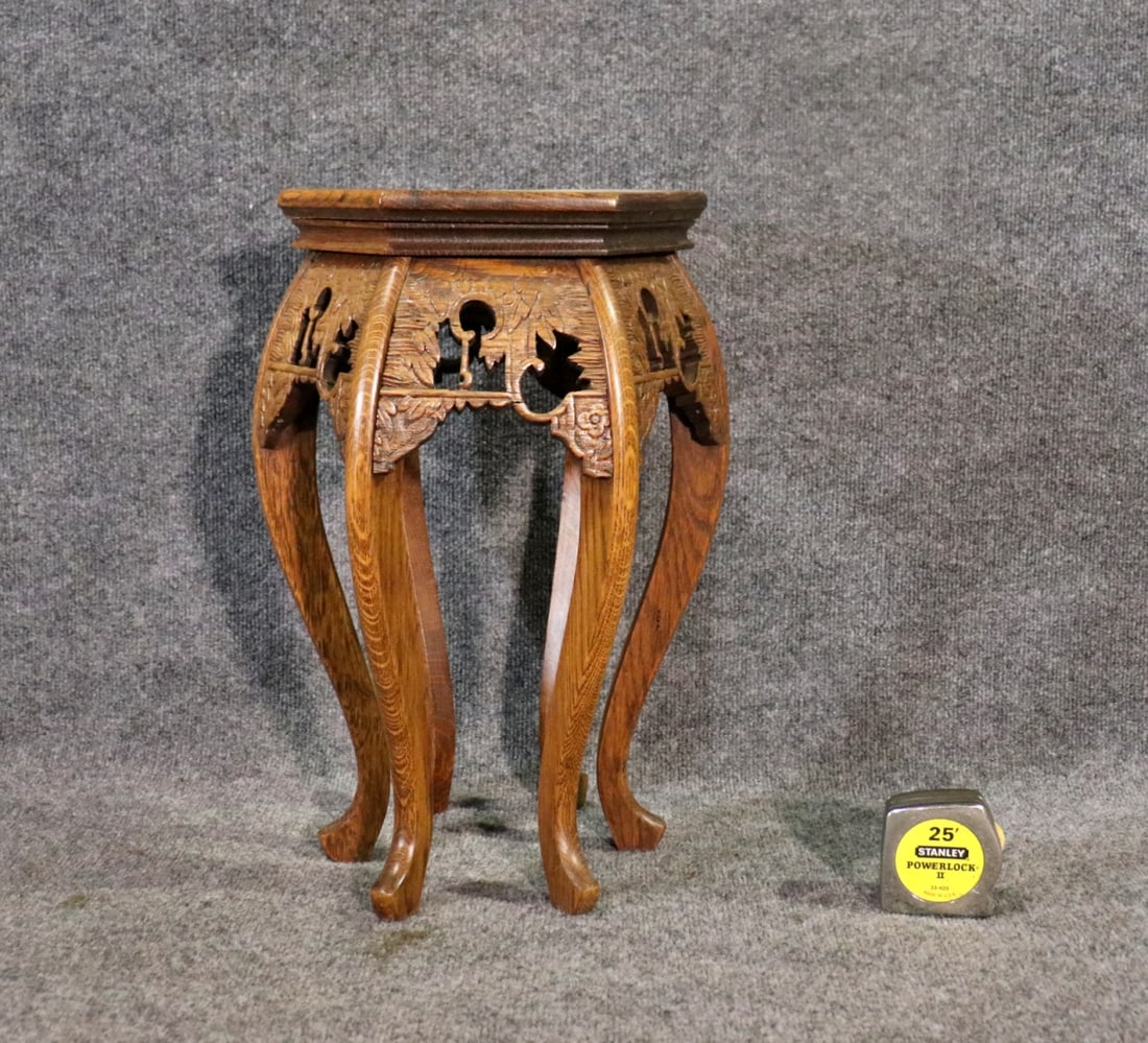 CARVED OAK PLANT STAND: Oak. 19 1/8" h x 13 1/2" w x 12" d.