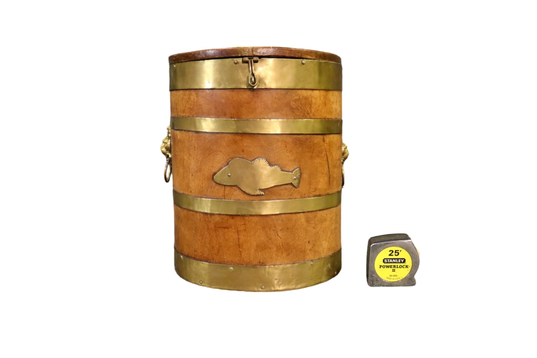 BRASS & WOOD FISHING CREEL: Brass. Wood. Lion figural handles. Fish on front. Lift up lid. 14 1/4" h x 11 1/4" w x 10" d.