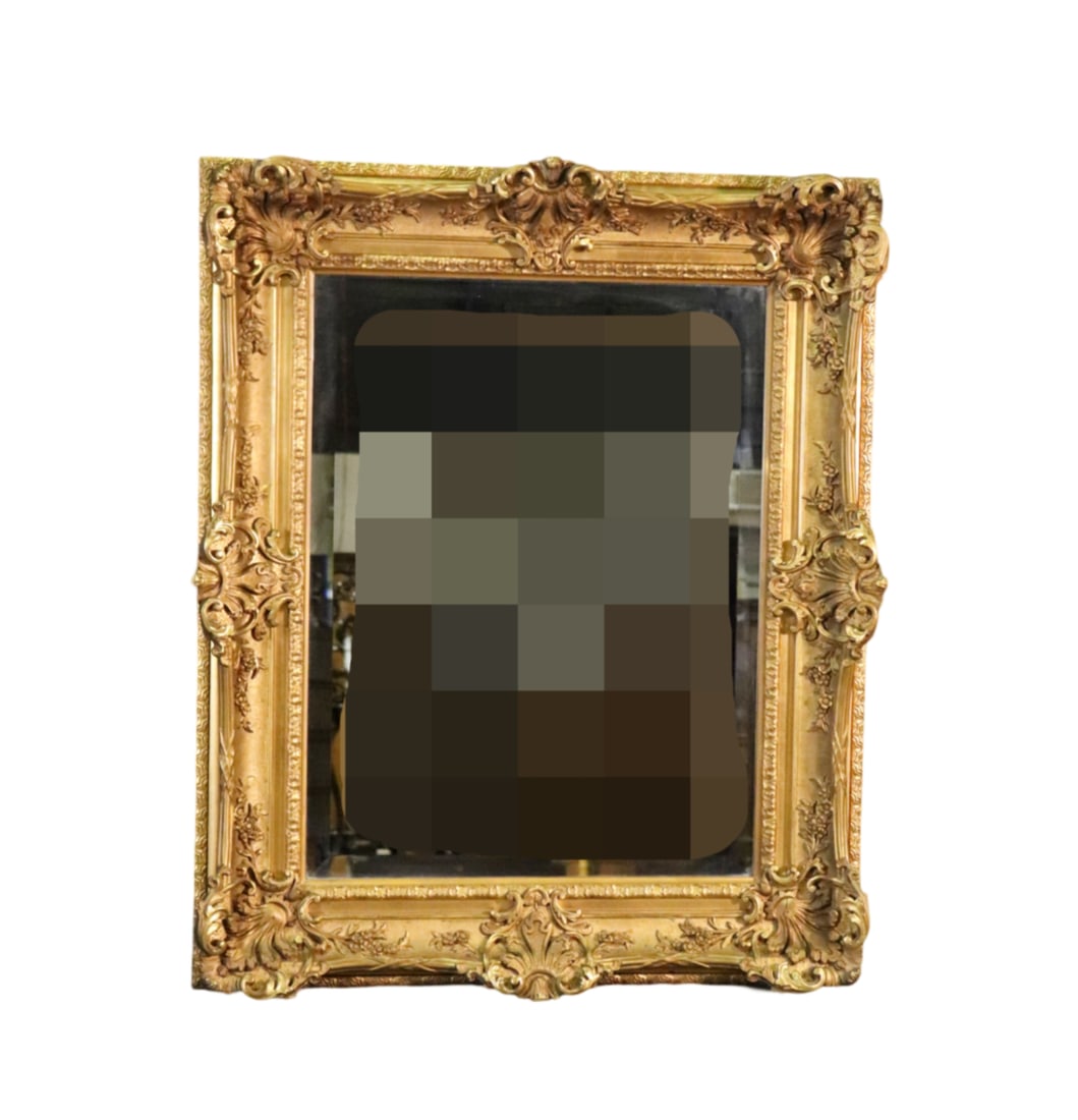 FRENCH BAROQUE GILT CARVED WALL MIRROR: Carved. Gilt. Composition over wood. Beveled glass. 47" h x 39" w x 4 1/4" d.