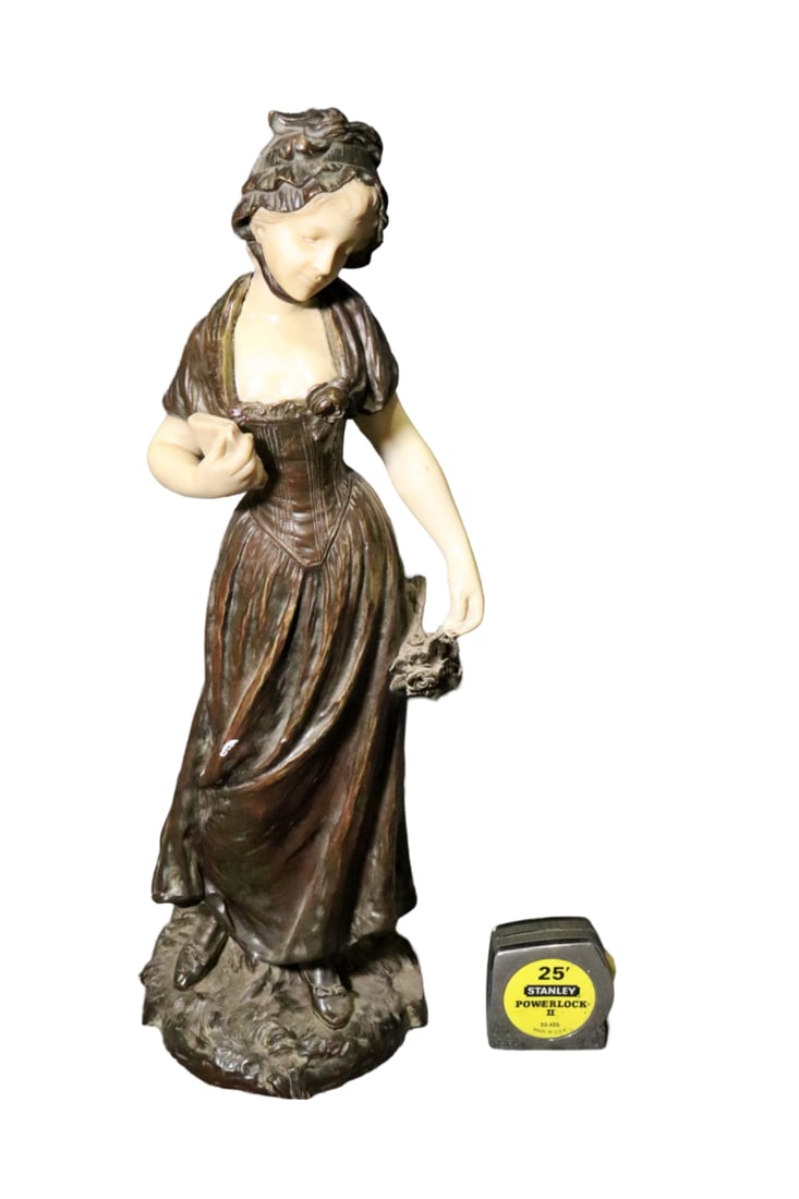 MOREAU BRONZE SCULPTURE GIRL WITH BOOK: Bronze. Painted. Hip Moreau signed on base. 23 5/8" h x 8" w x 7 1/4" d.