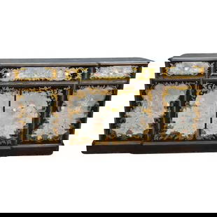 ITALIAN SILVER LEAF CHINOISERIE EGLOMISE SIDEBOARD: 1950's era. Reverse paint decorated scenery of Chinese life and pagodas. Mirrored glass. Parcel gilded silver leaf behind painted scenes. 3 drawers. 3 doors. 35 1/2" h x 72 1/4" w x 17 3/4" d.