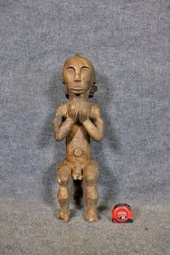 CARVED AFRICAN SCULPTURE
