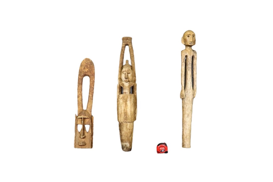 3 CARVED AFRICAN SCULPTURES: Carved wood. One measures 30" h x 5 1/2" w x 5 1/2" d. One measures 39" h x 6 1/2" w x 6 1/2" d. One measures 39" h x 5 1/4" w x 5 1/4" d.