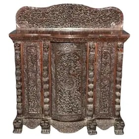 CARVED DARK TEAK ANGLO-INDIAN DOG & PAW FOOTED CABINET