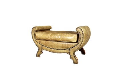 LEATHER UPHOLSTERED OTTOMAN