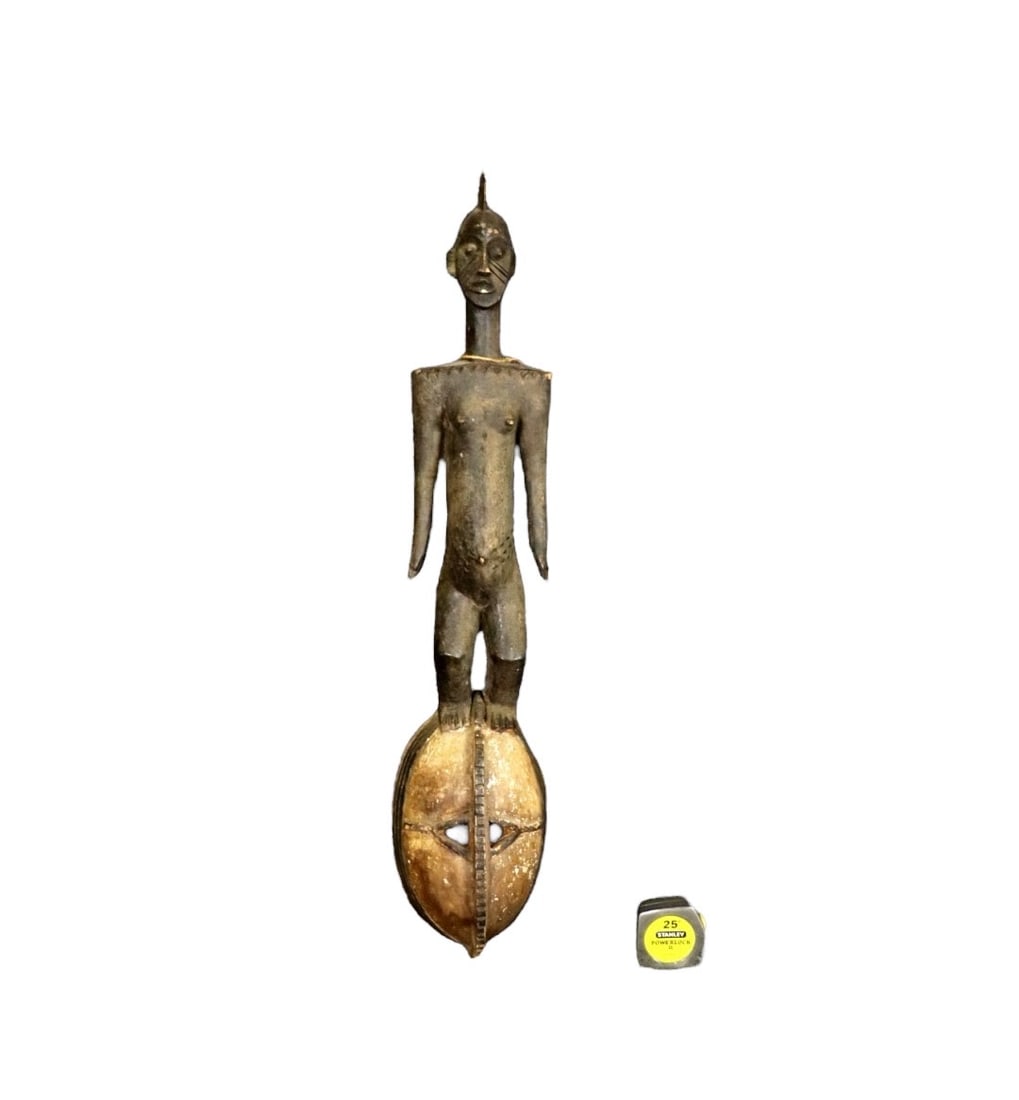 CARVED AFRICAN FIGURE: Carved. Wood. 36" h x 8" w x 6 5/8" d.