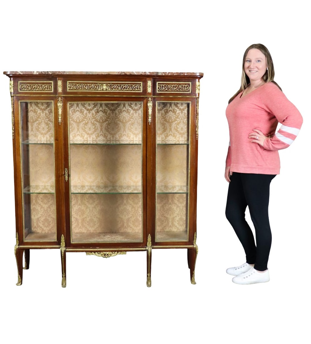 LOUIS XV STYLE MARBLE TOP BRONZE MOUNTED VITRINE: Marble top. Bronze mounted. 1 glass door. 2 glass shelves. 55 1/2" h x 50 1/2" w x 15 7/8" d.