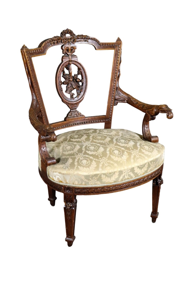 FRENCH LOUIS XVI STYLE CARVED OPEN ARM CHAIR: Carved. Upholstered seat. 35 1/4" h x 24" w x 25" d. Seat height 17 1/2".