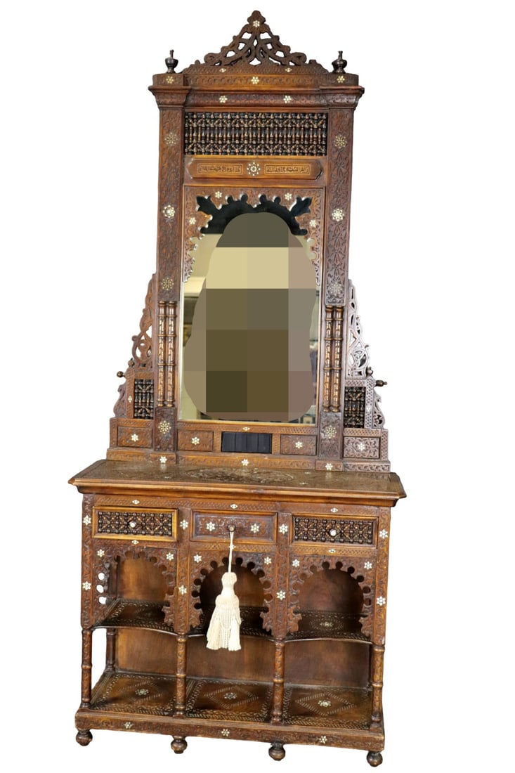 MOROCCAN CONSOLE & MIRROR: Wood. Carved. Bone inlay. Console has 3 drawers and two shelves. Console measures 34 3/4" h x 41" w x 15" d. Mirror measures 60 1/2" h x 38 1/4" w x 1" d.