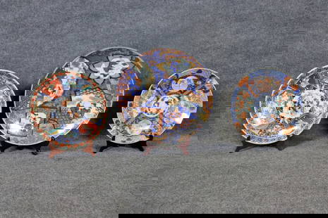 3 IMARI JAPANESE PORCELAIN CHARGERS: Porcelain. Painted. One signed on back. One measures 2 1/2" h x 16 1/4" diameter. One measures 2 1/2" h x 18" diameter. One measures 3" h x 21" diameter.