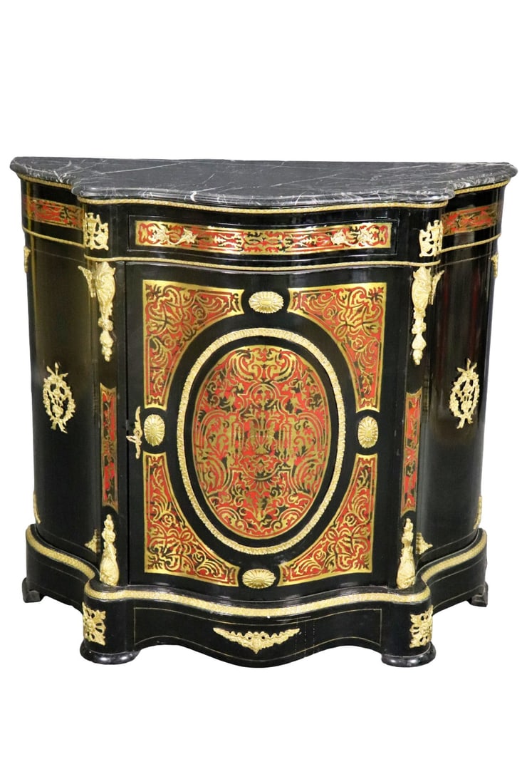 BRONZE MOUNTED MARBLE TOP BRASS INLAID CABINET: Marble top. Brass inlaid. Ebonized. One door containing one shelf. 41 1/2" h x 44 1/4" w x 18" d.