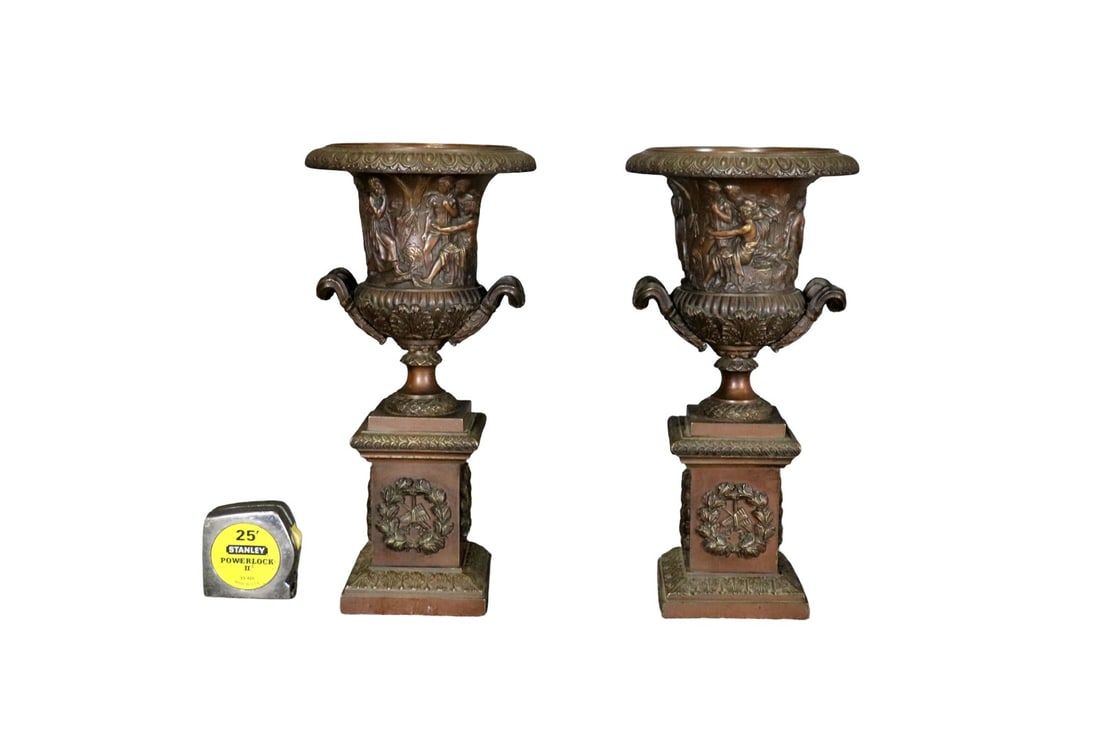 PAIR LOUIS XVI STYLE URNS WITH HANDLES: Bronze. 15 1/2" h x 8" diameter.