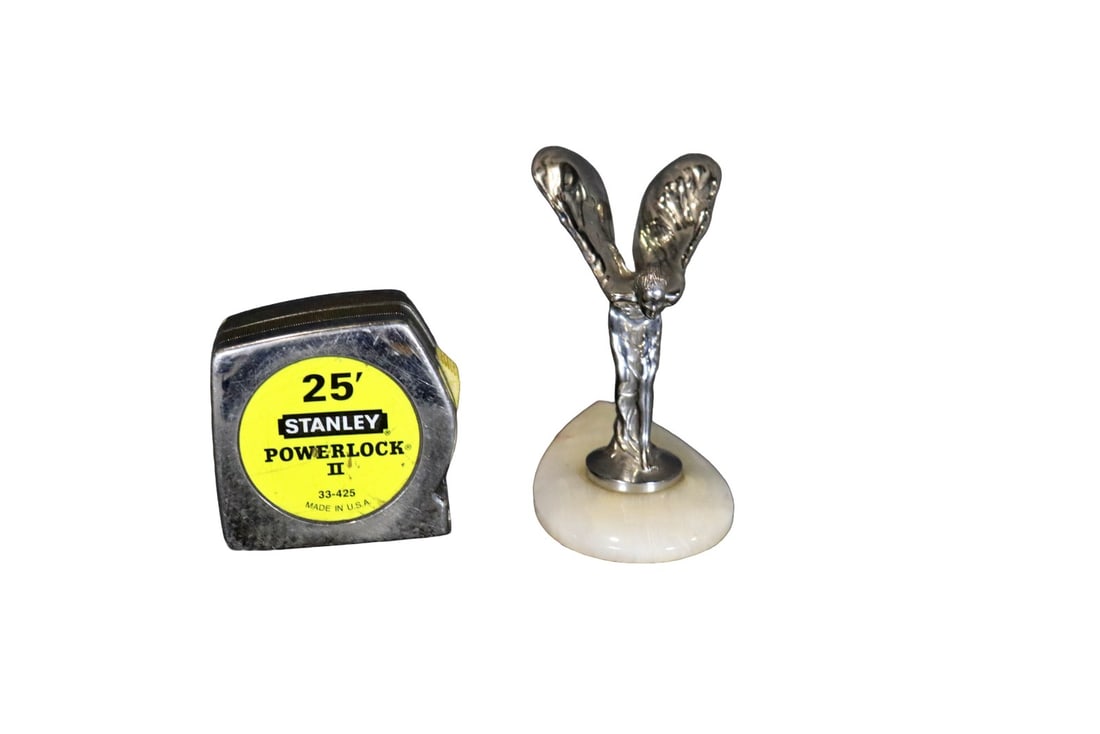 SPIRIT OF ECSTASY SCULPTURE: Alabaster base. Metal. 4 3/4" h x 3" w x 5 1/4" d.