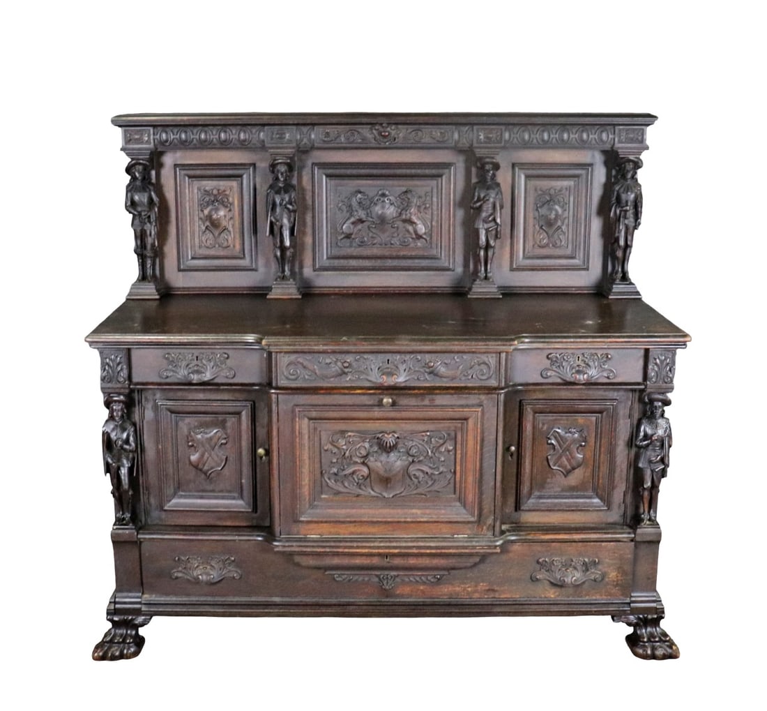 CARVED VICTORIAN FIGURAL BUFFET: Carved. Figural. Claw feet. 61 3/4" h x 68 3/4" w x 27 1/4" d.