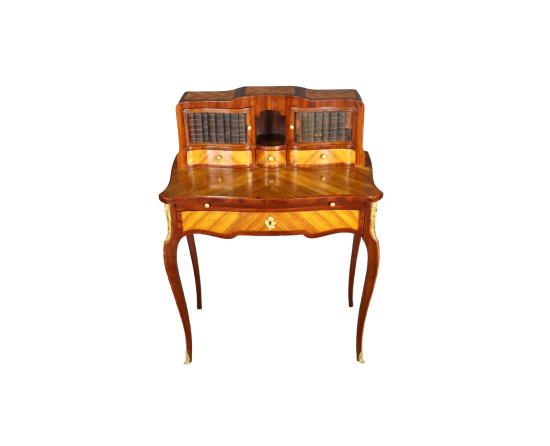 FRENCH LOUIS XV BRONZE MOUNTED INLAID DESK: Leather faux book front 2 doors. Bronze mounted. Inlaid. Pullout tray. 4 drawers. 39 1/2" h x 30 1/2" w x 17 1/2" d.