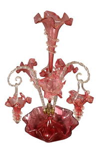 CRANBERRY GLASS FLOWER EPERGNE: Glass. Metal at base. 10 removable pieces. 21" h x 15" w x 12 1/2" d.