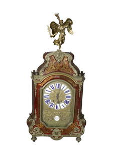 FIGURAL BRONZE RED LACQUER MANTLE CLOCK: Bronze. Red Lacquer. Balitzar Martinot Paris on front. 36 1/4" h x 19" w x 6 1/4" d.