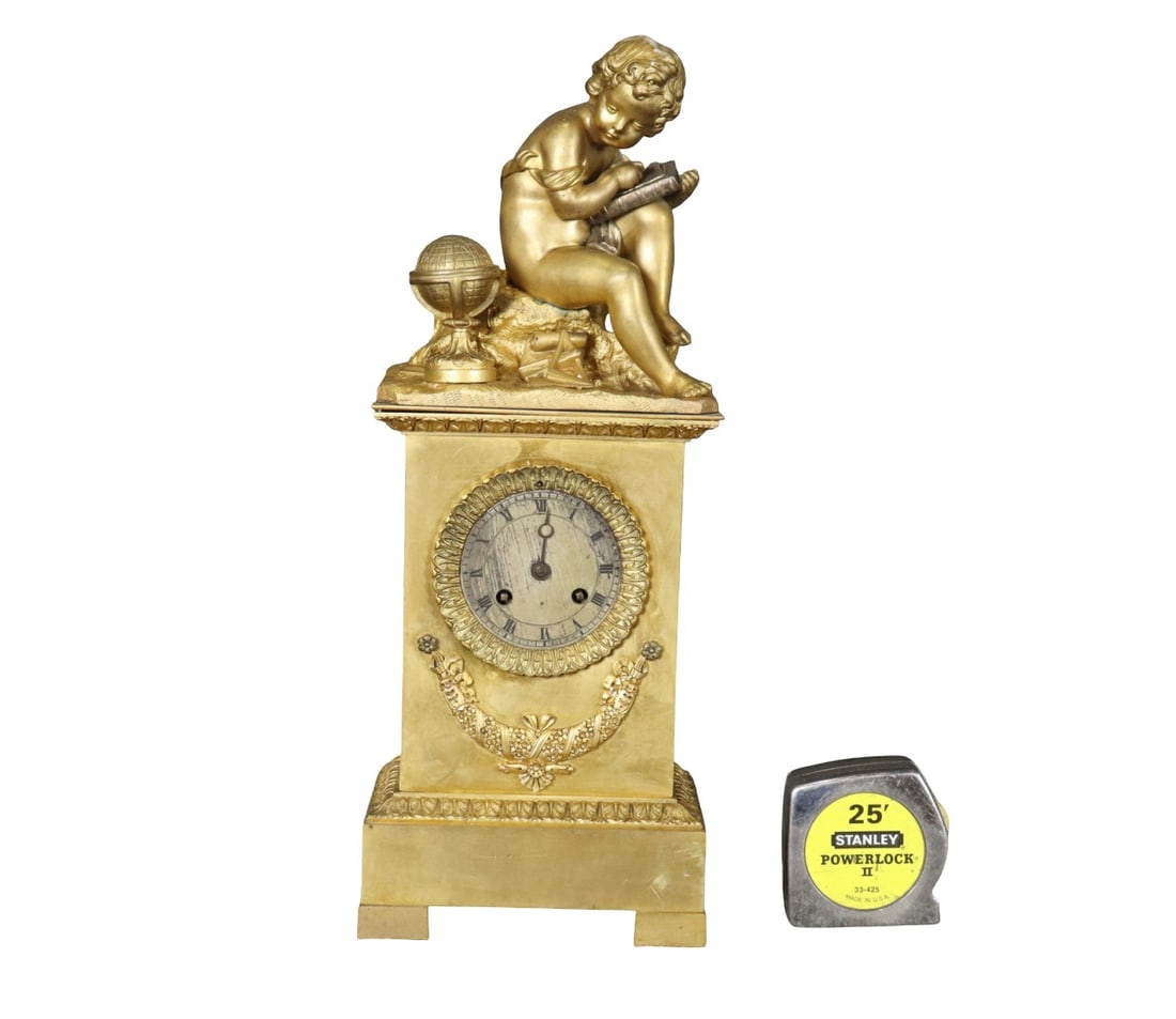 BRONZE FIGURAL CLOCK WITH FRENCH BOY READING: Bronze. 17" h x 6 3/4" w x 3 3/4" d.