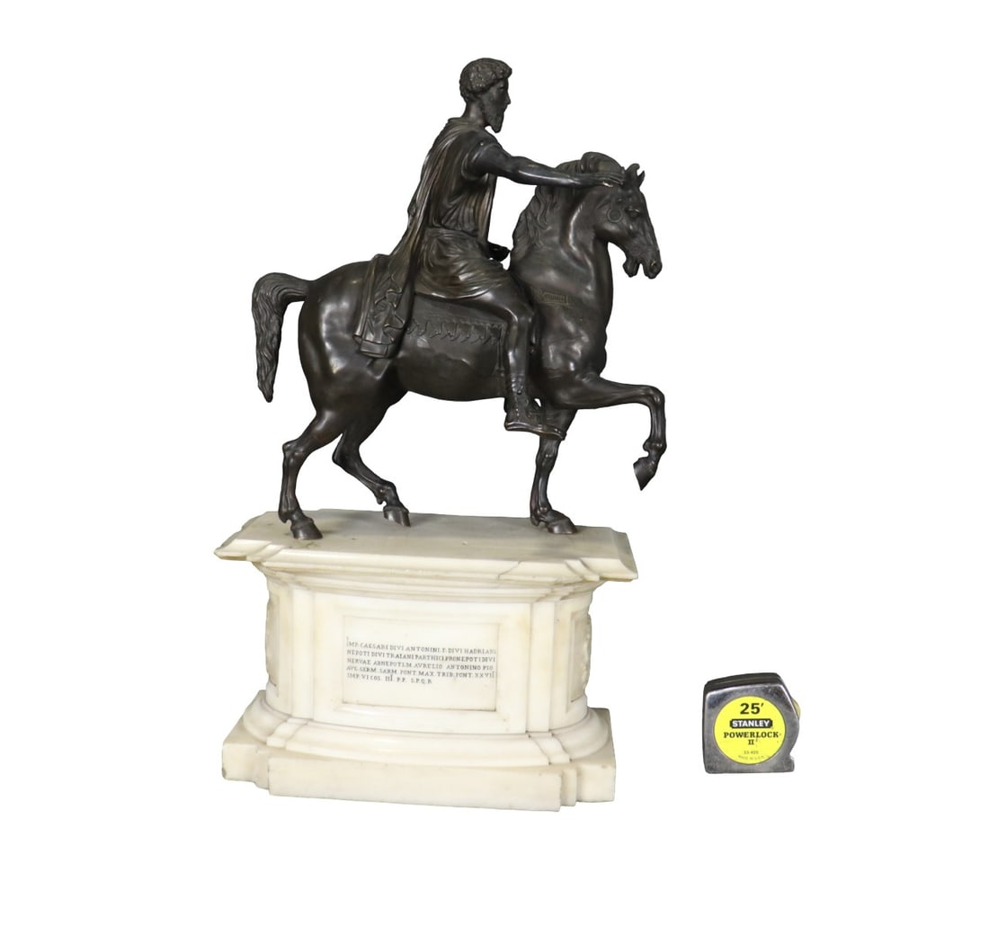 BRONZE FIGURE OF MAN ON HORSE WITH MARBLE BASE: Bronze. Marble. 23 1/4" h x 14 1/2" w x 8 1/2" d.