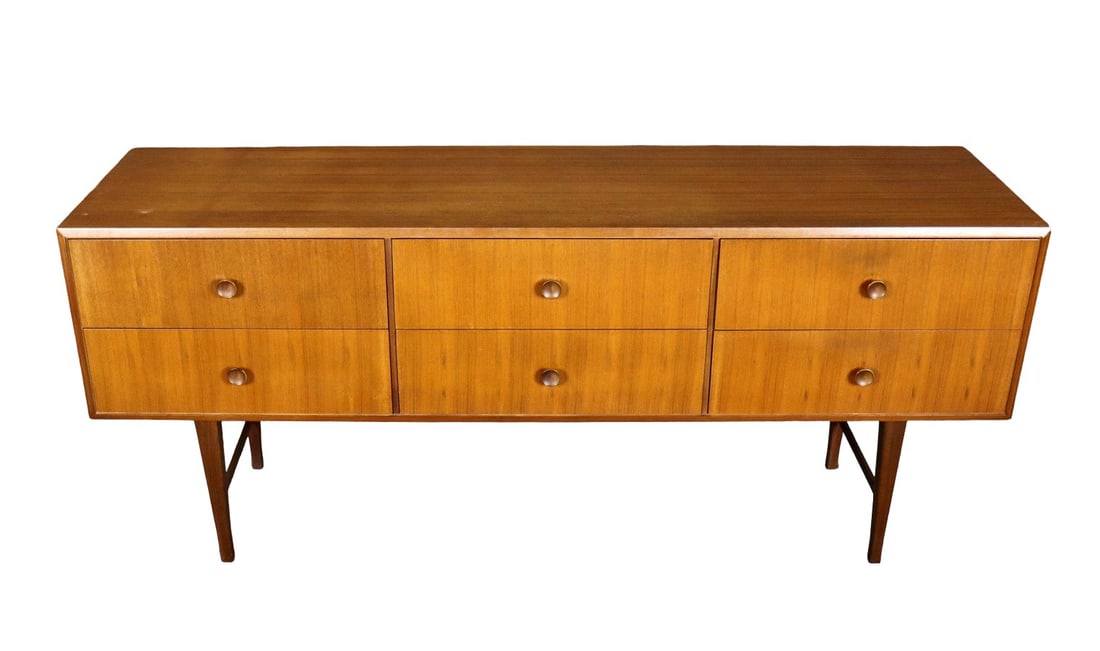 MID CENTURY MODERN TEAK SIDEBOARD: Teak. 6 dovetailed drawers. 28 1/2" h x 66 1/8" w x 18 1/2" d.