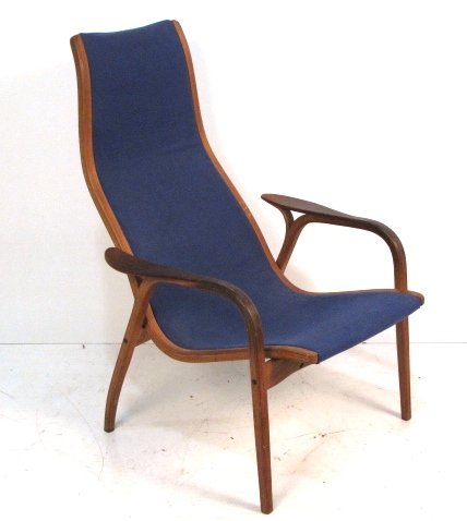 YNGVE EKSTROM LAMINO TEAK LOUNGE CHAIR: Laminated teak. Good condition. 37 1/2"h. x 27 1/2"w. x 35"d.