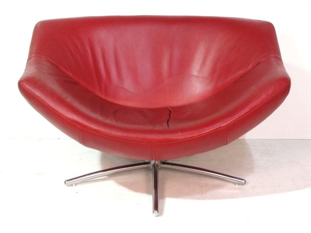 GERARD VAN DEN BERG LEATHER GIGI CHAIR: Good condition. Cigarette burn. Some scratches. 34"h. x 47 1/2"w. x 26 1/2"d.