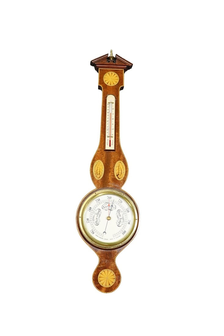 ENGLISH BAROMETER: Heavily carved wood. White face and thermometer at bottom. 34 3/4" h x 8 3/4" w x 2 1/4" d.