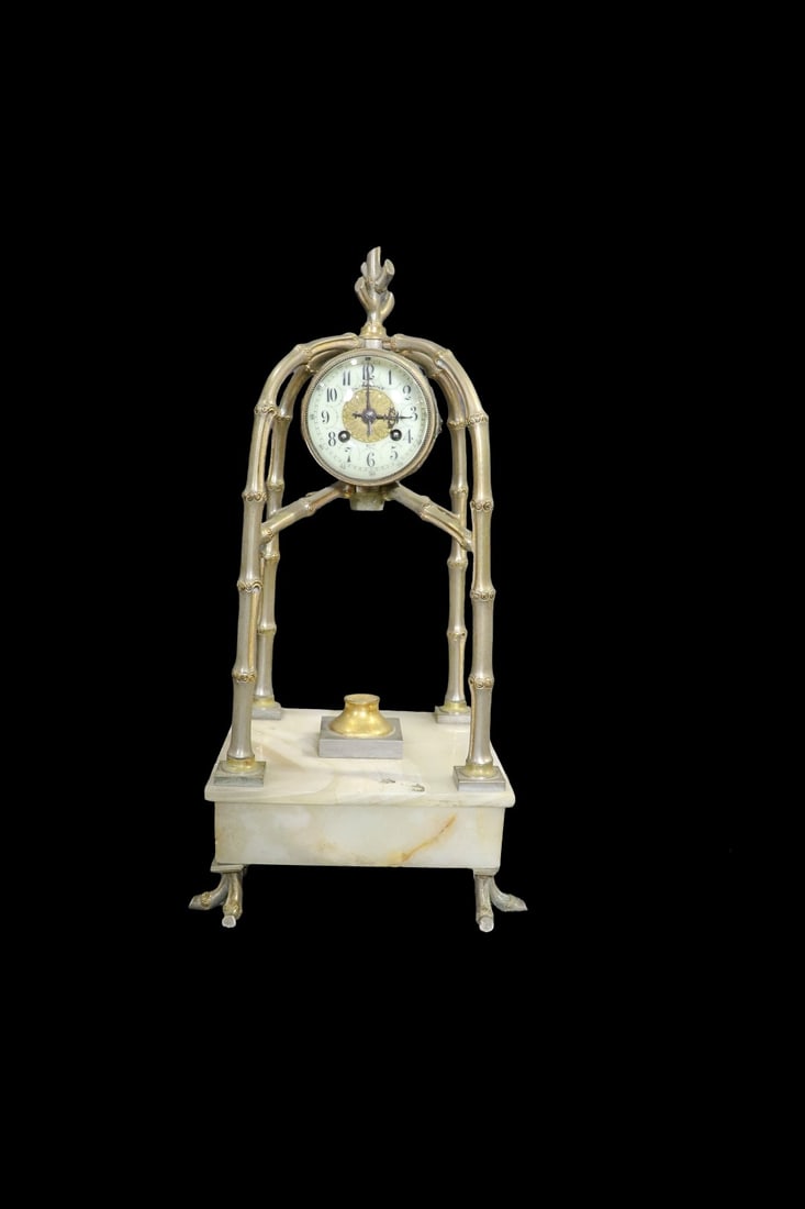 BRONZE & MARBLE CLOCK: Stamped on back. Bronze. Marble. 19 1/2" h x 10" w x 10" d.