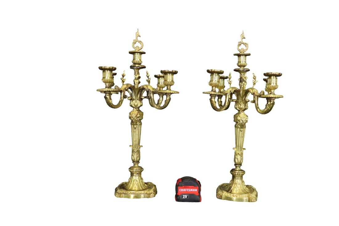 PAIR BRONZE 4 ARM CANDELABRAS: Bronze. 4 arms. Figural rams head. 22 5/8" h x 13 3/4" diameter.