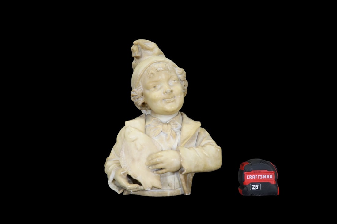 ALABASTER BUST OF BOY: Alabaster. 14 3/4" h x 11" w x 7" d.