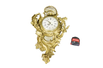 BRONZE WALL CLOCK WITH WEAVE & FLORAL DESIGN