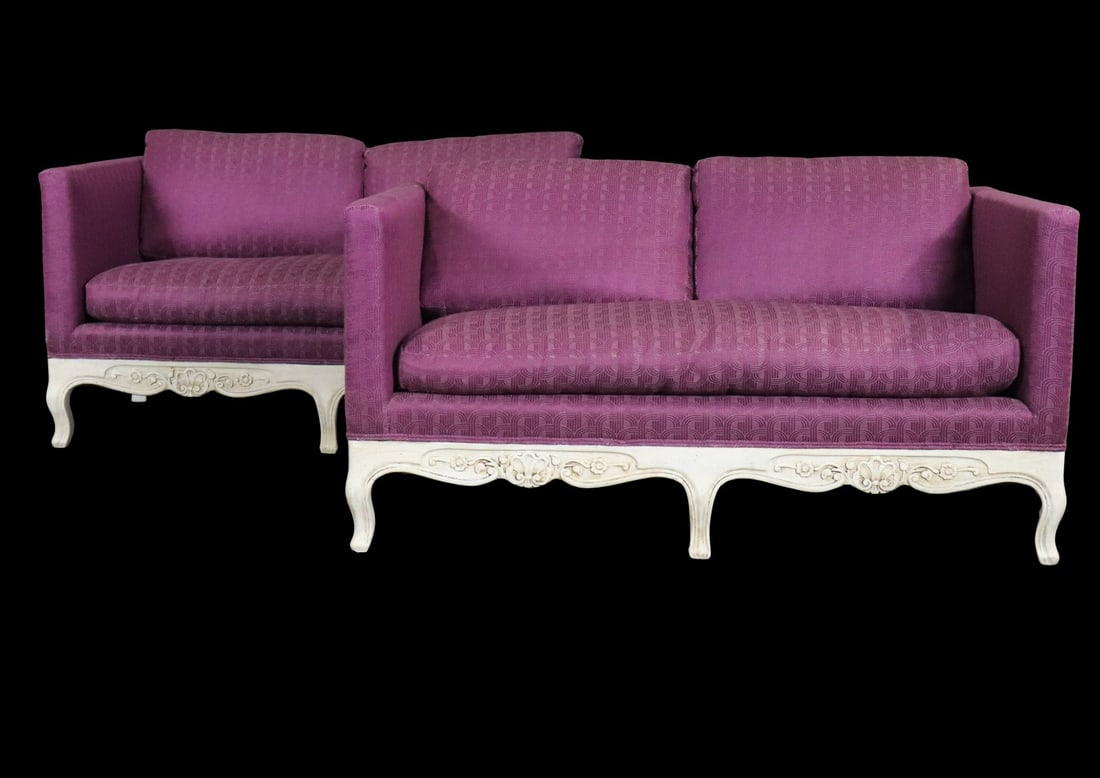 PAIR COUNTRY FRENCH SETTEES: Carved painted frame. Upholstered. 27 1/2" h x 55" w x 23 1/2" d. Seat height 18".