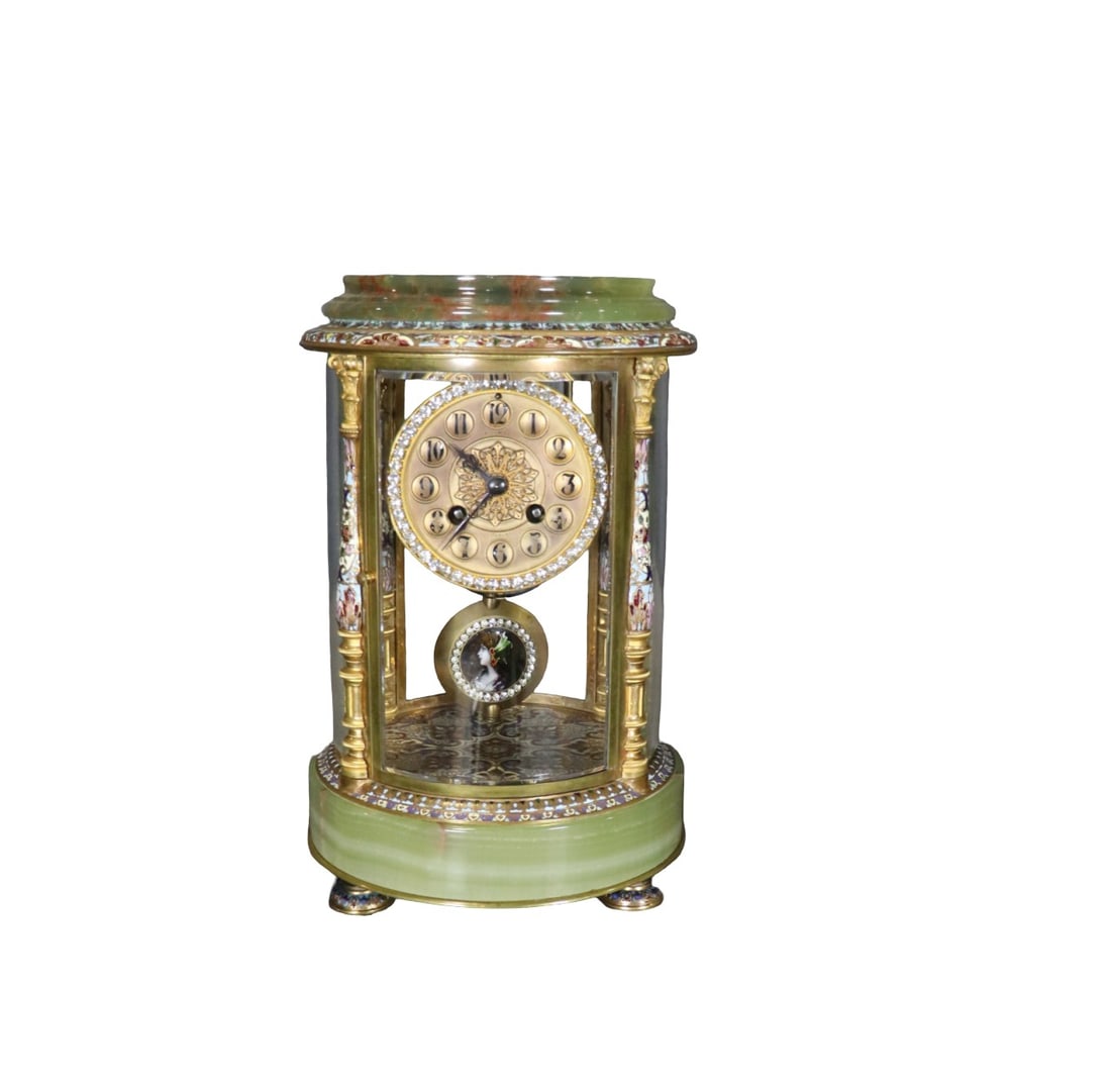 ONYX & ENAMEL CLOCK: Onyx. Enamel. Glass. With key and pendulum. 13" h x 8" diameter.