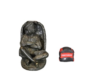 BRONZE SCULPTURE OF SITTING BOY