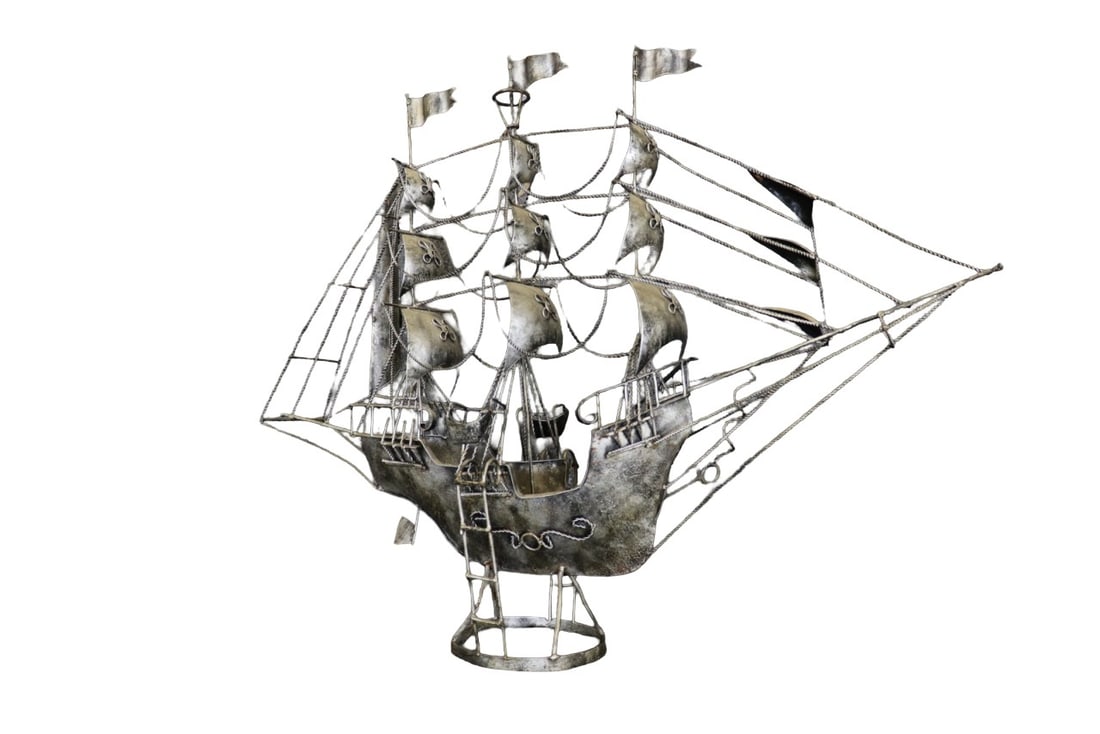 METAL SCULPTURE SAILING SHIP: Metal. Illegible signature. 32 1/2" h x 40" w x 9 1/2" d.
