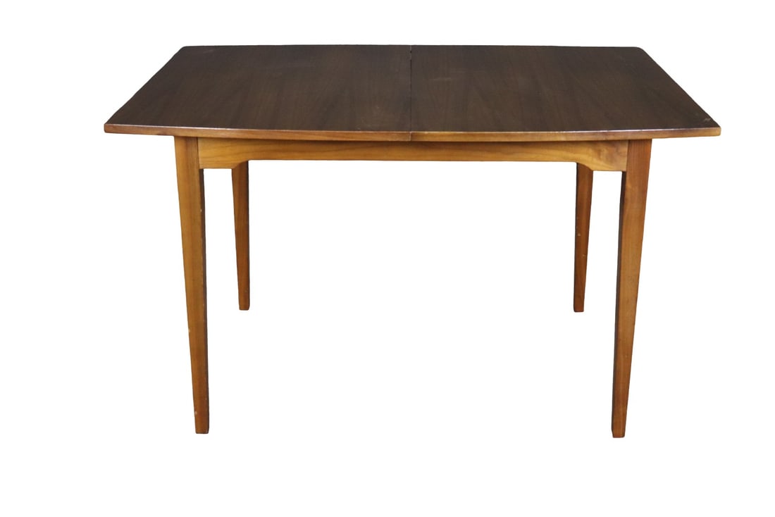MID CENTURY MODERN TEAK DINING TABLE: Teak. 29 1/4" h x 48" w x 35 3/8" d. 1 - 18" leaf.