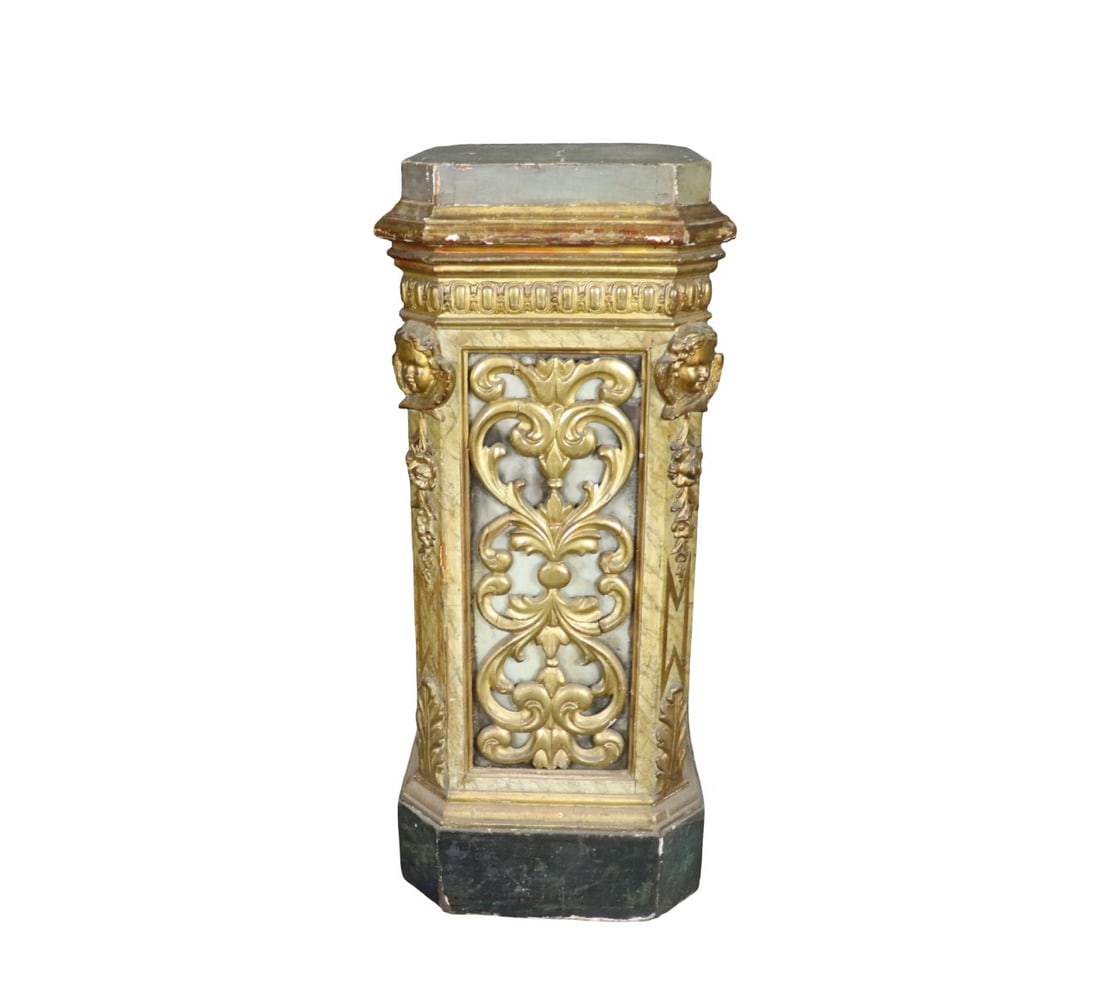 CARVED GILTWOOD PEDESTAL: Carved. Giltwood. Painted. Figural. 44 1/4" h x 18 1/2" square.